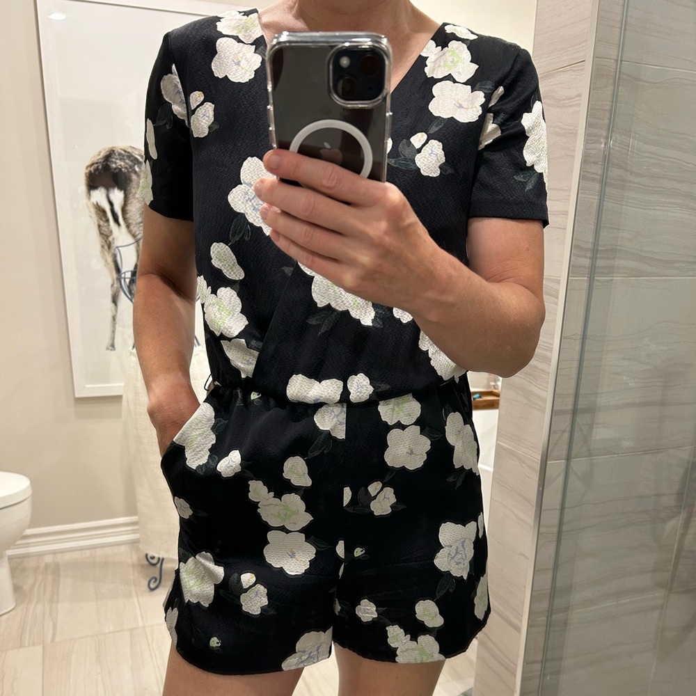Club Monaco 100% Silk black and white floral romper. Size 2. Lined.